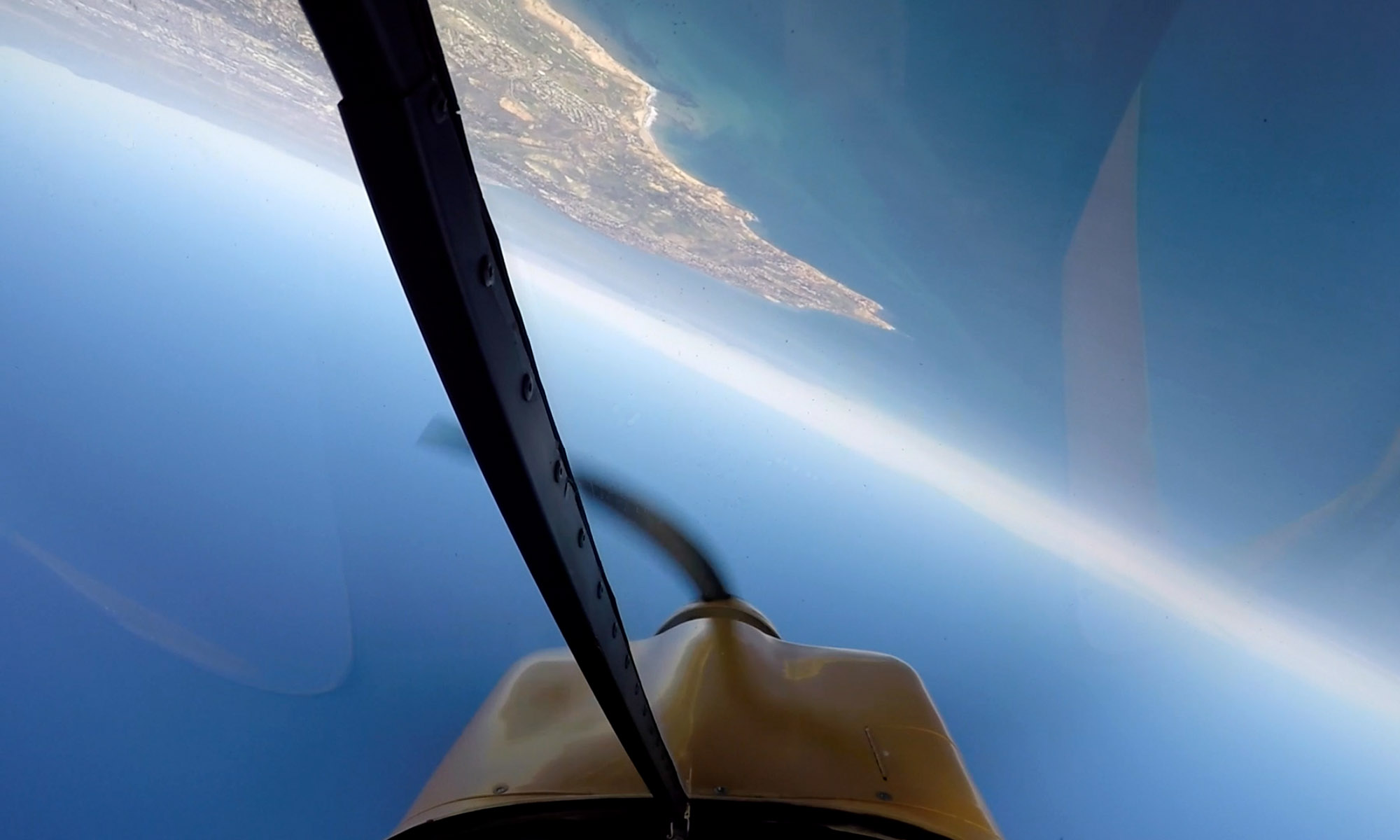 Aerobatic airplane flying inverted